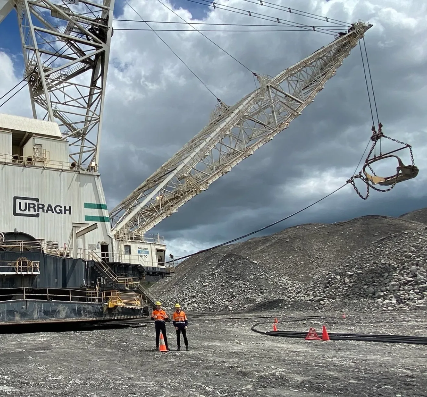 Two Bigmate engineers in front of the Curragh dragline